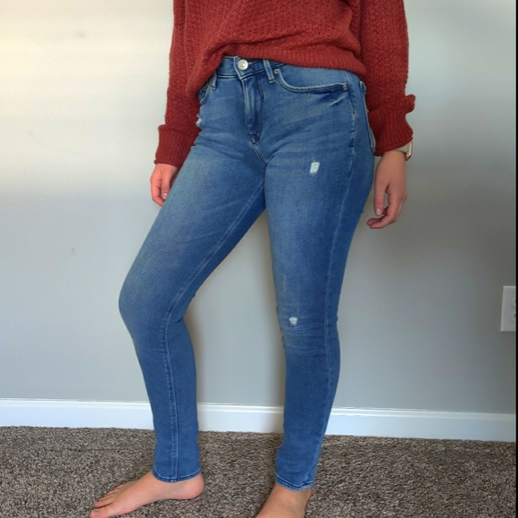 Distressed fleece lined jeans